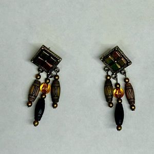 - Materials: silver and wood 
- Colors: Wooden